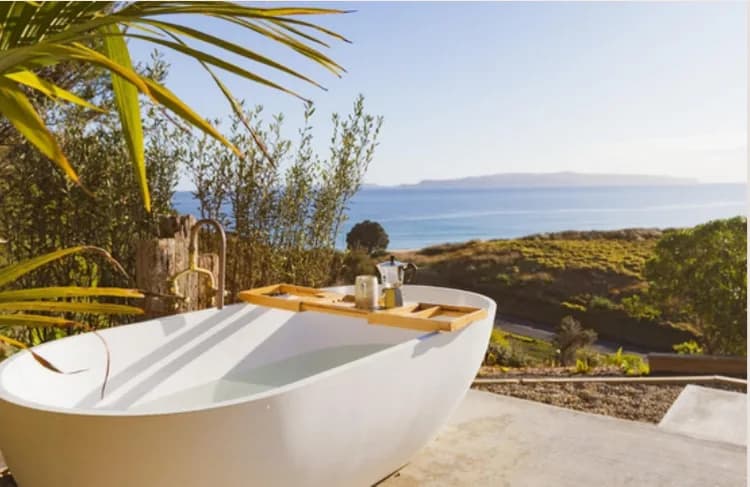 Limestone freestanding bath on a coastal terrace